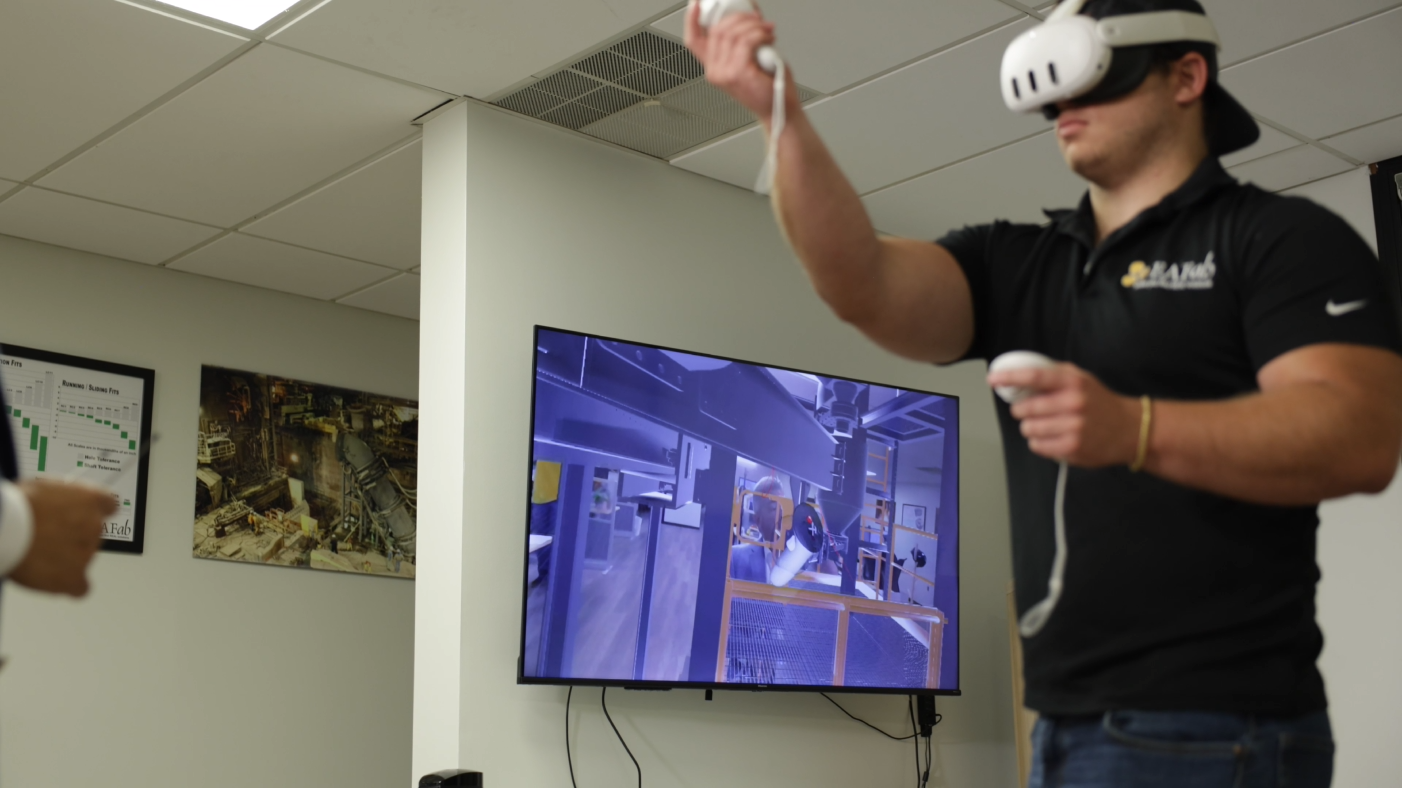 EAFab engineer working in a Virtual Reality environment. EAFab Corporation, North American Steel Industry Supplier, Meltshop equipment